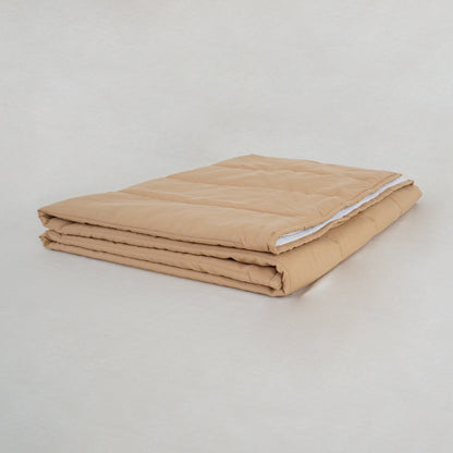 folded  beige blanket