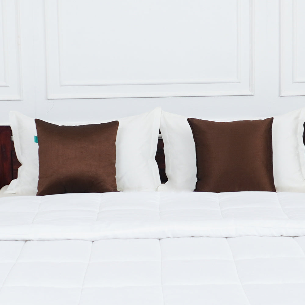 cushions on bed